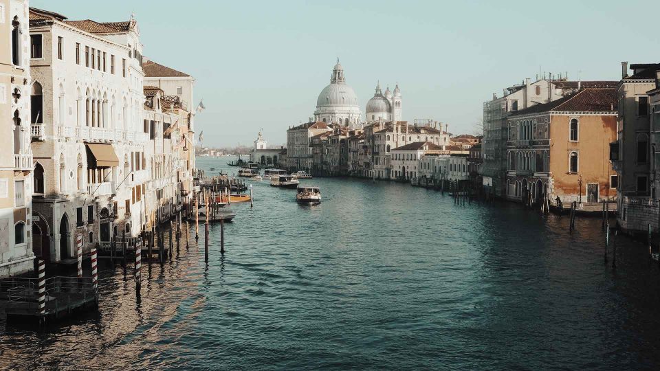 body of water between buildings